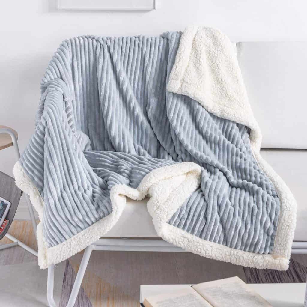 Blue and white snuggly blanket for cold miserable nights.