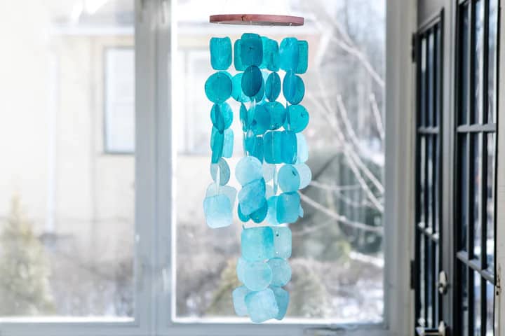 Beautiful teal wind chime from Beyond Flowers and Food, a great grief gift ideas.