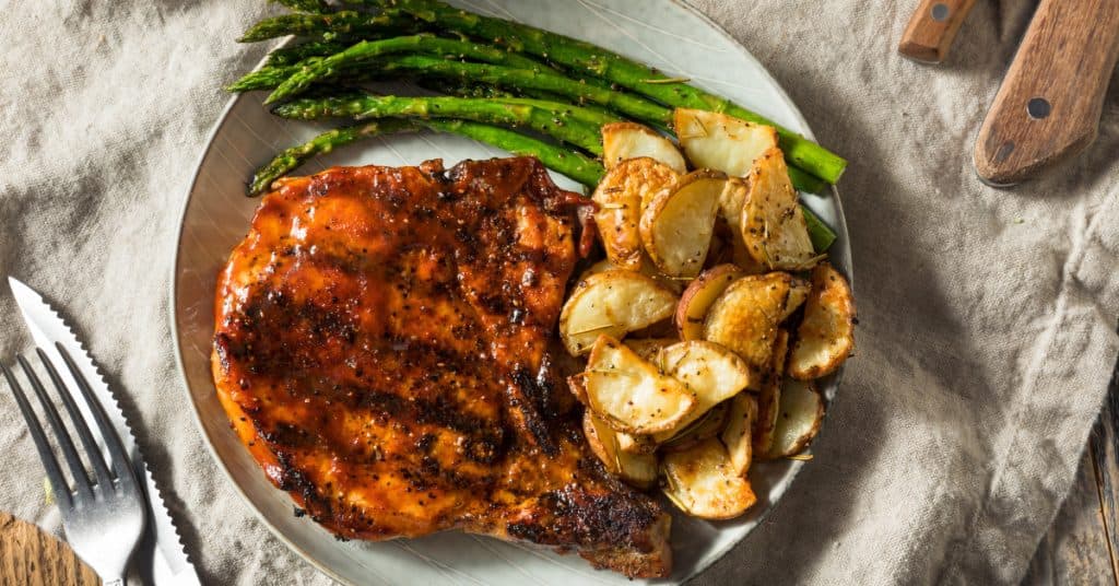 Grilled Pork chops, potatoes and asparagus